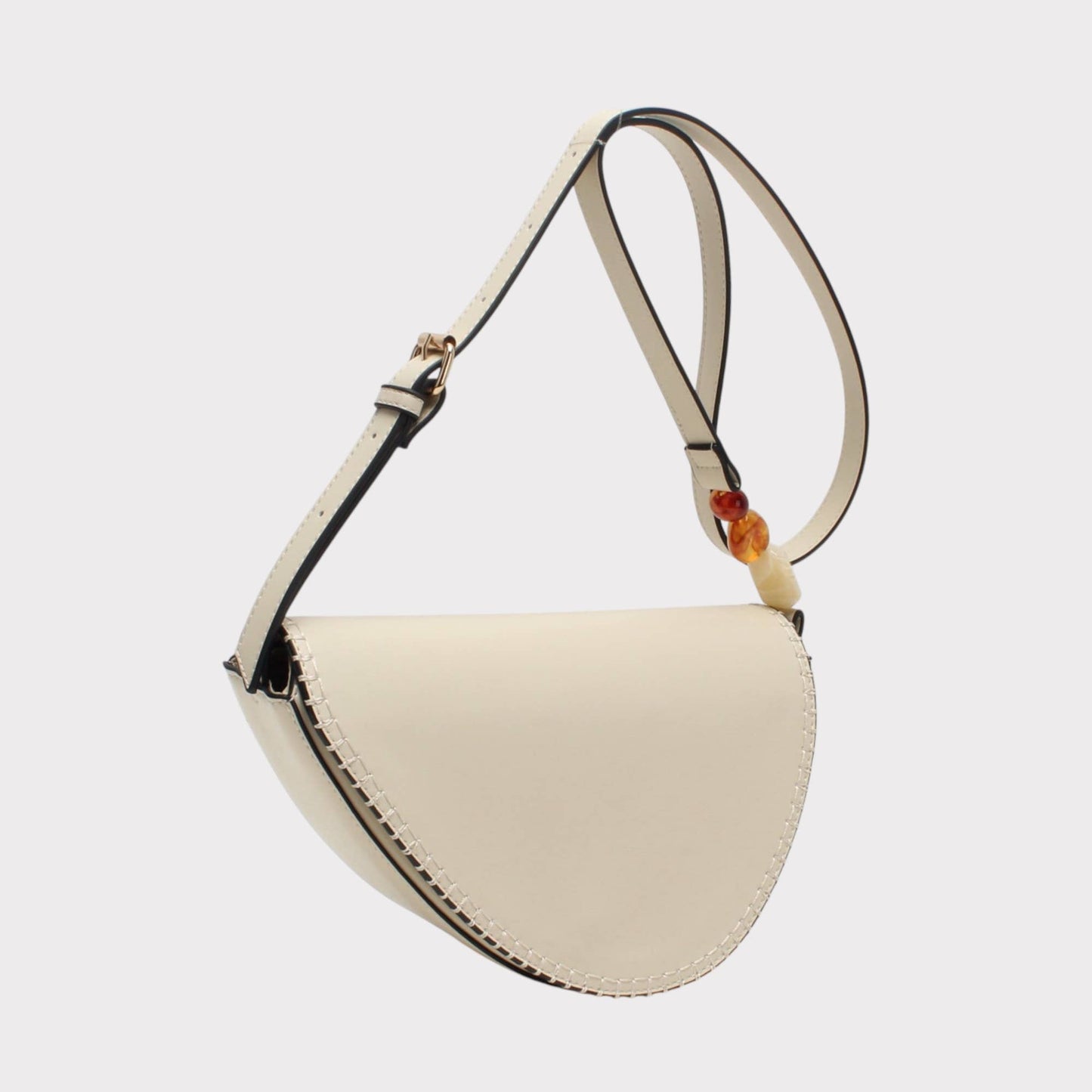 Bolso bandolera forma almendra con piedra decorativa: Crudo