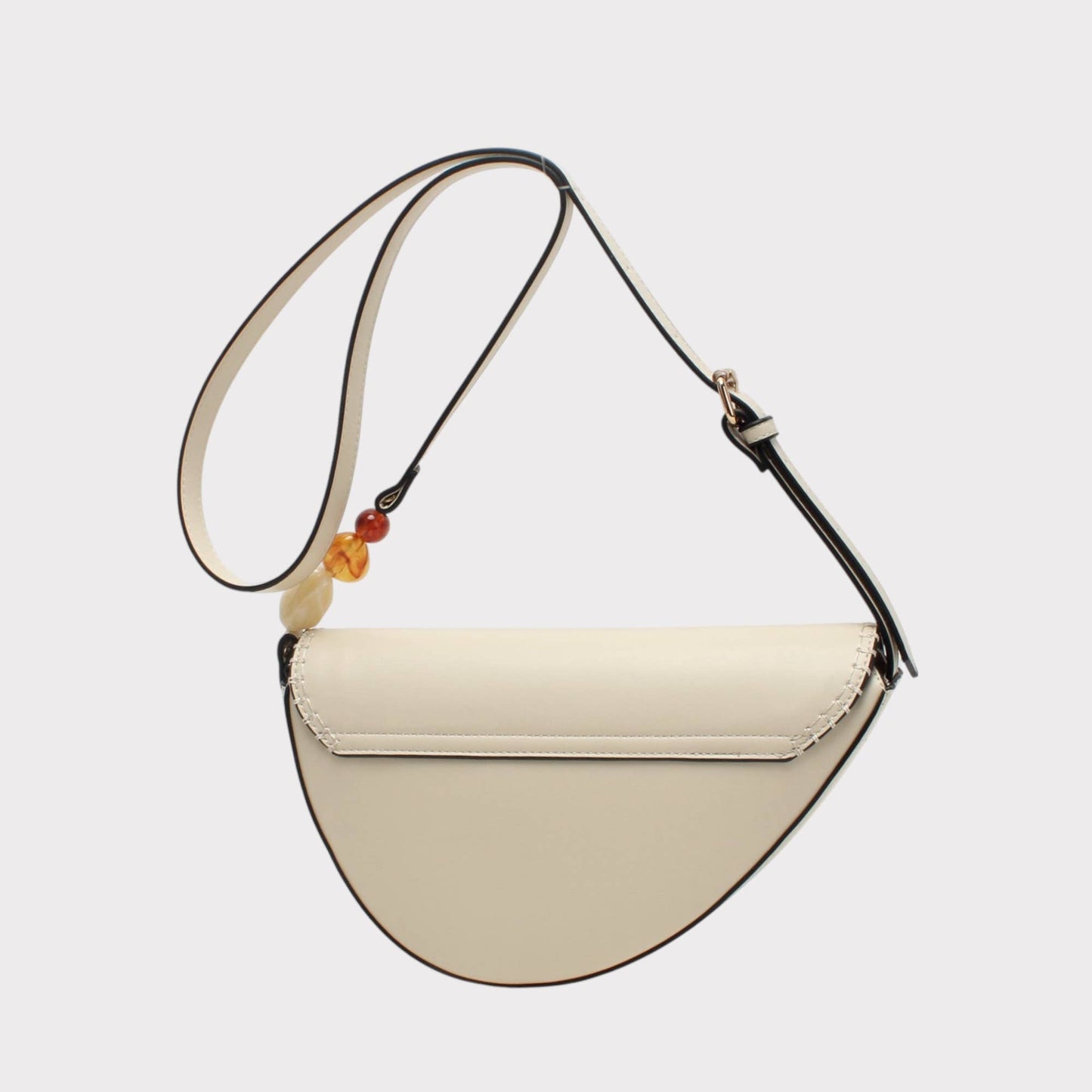 Bolso bandolera forma almendra con piedra decorativa: Crudo