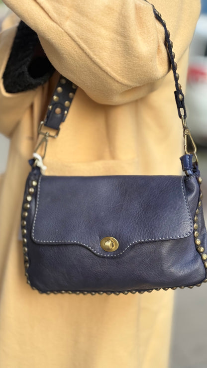 Bolso piel tachuela